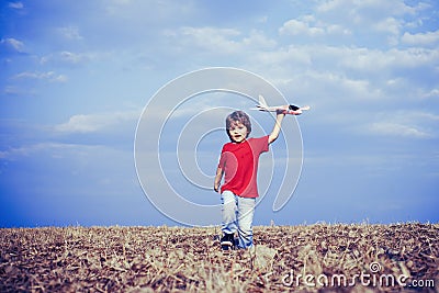 Childhood memories. Active leisure with kids. Kid pilot having fun on meadow. Summer leisure. Cherishing memories of Stock Photo