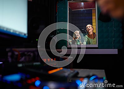 Children band singing at record studio selective focus Stock Photo