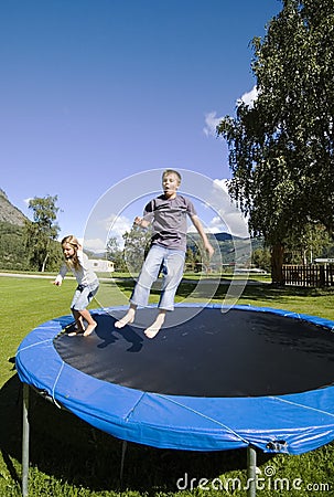 Children bouncing. Stock Photo