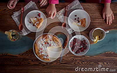 Children breakfast with Cheesecake with cranberries and sugar Stock Photo