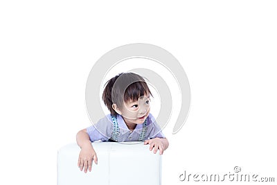 Children catch a chair and smile. Stock Photo