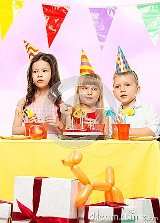 Children celebrating birthday Stock Photo