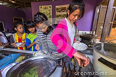 Children in the classroom at lunch time at school by project Cambodian Kids Care Editorial Stock Photo