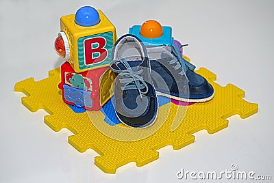 Children cubes and booties Stock Photo