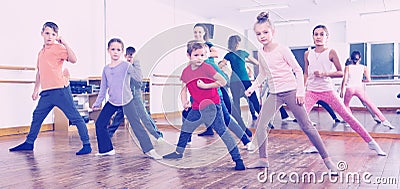 Children dancing contemp in studio smiling and having fun Stock Photo