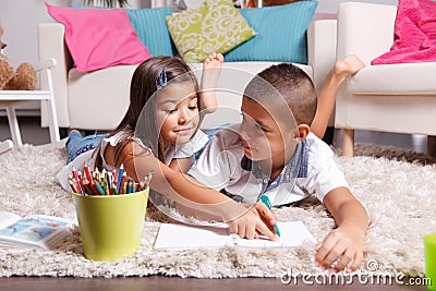 Children doing homework at home Stock Photo