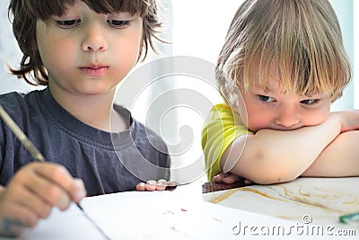 Children draw in home Stock Photo