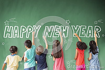 Children drawing happy new year on the chalkboard Stock Photo