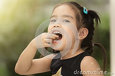 Children feel happy eating candy Stock Photo