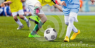 Children Football Players Running After the Ball. Kids Sport Duel Stock Photo