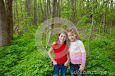 Children friend girls playing on the jungle park forest Stock Photo