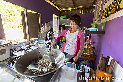 Children get food at lunch time at school by project Cambodian Kids Care to help deprived children Editorial Stock Photo