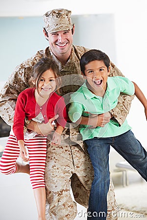 Children Greeting Military Father Home On Leave Stock Photo