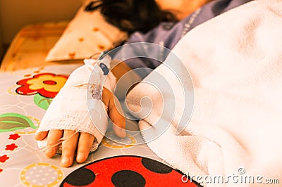 Children hand intravenous The brine Stock Photo