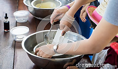 Children hand making home made ice cream cooking class Stock Photo