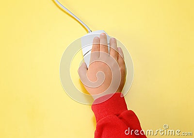 Children hand with mouse Stock Photo