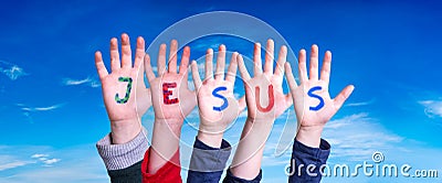Children Hands Building Word Jesus, Blue Sky Stock Photo