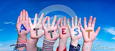 Children Hands Building Word Attest Means Attestation, Blue Sky Stock Photo