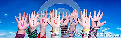 Children Hands Building Word Vielfalt Means Diversity, Blue Sky Stock Photo