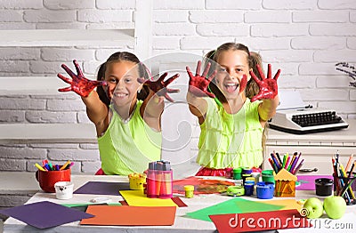 Children happy smiling with colored hands Stock Photo