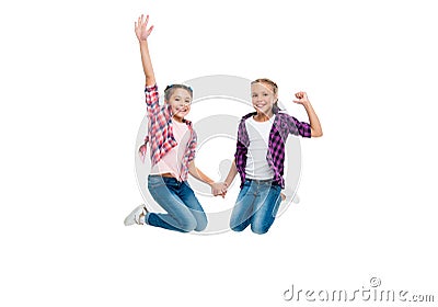 children have fun together. bond of sisterhood and friendship. girls friends having fun and jumping. friendship of two Stock Photo
