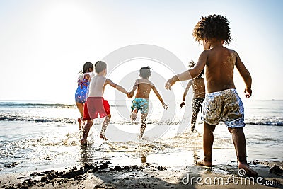 Children having fun on the beach Stock Photo