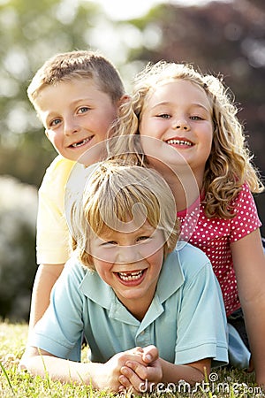 Children having fun in countryside Stock Photo