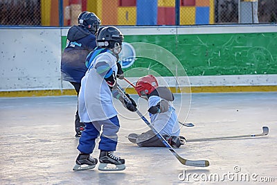 Children with hockey sticks playing hockey at the festival Editorial Stock Photo