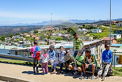 Children in a Knysna township near Mandela houses Editorial Stock Photo