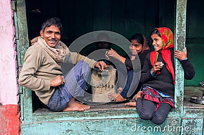 Children with laughing happy father and mother Editorial Stock Photo