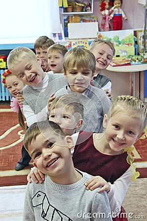 Children are laughing in kindergarten. Funny kids. Baby smiles Editorial Stock Photo