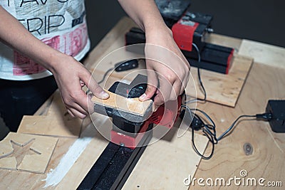 Children learn to make custom objects in fablab classes. Stock Photo