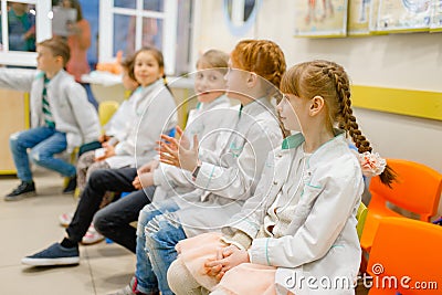 Children learning doctor profession in classroom Stock Photo