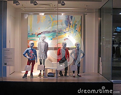 Children mannequins in a shop window display. Editorial Stock Photo