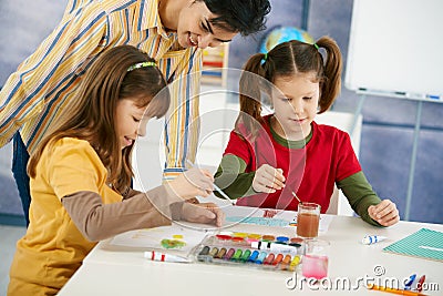 Children painting in art class Stock Photo