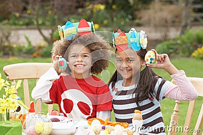 Children Painting Easter Eggs In Gardens Stock Photo