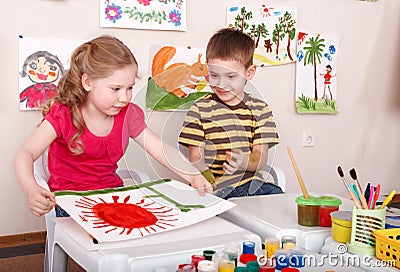 Children painting in play room. Stock Photo