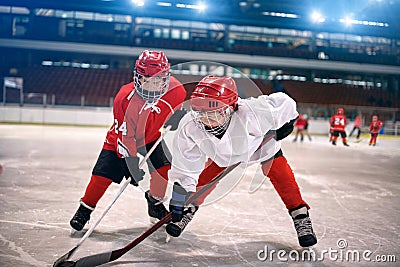 Children play ice hockey Stock Photo