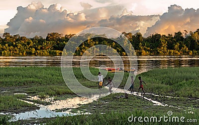 Children play on the river bank Editorial Stock Photo