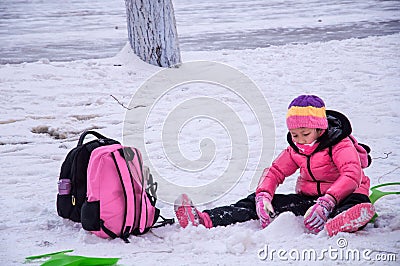 Children play with snow Editorial Stock Photo