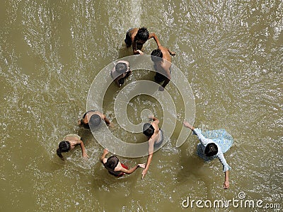 Children play in water Editorial Stock Photo