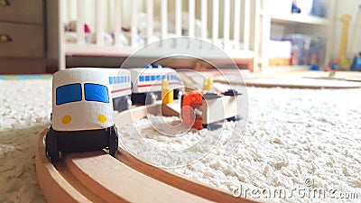 Children play wooden train in the nursery Stock Photo