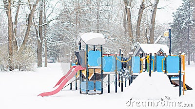 Children playground in a public park in winter. Stock Photo