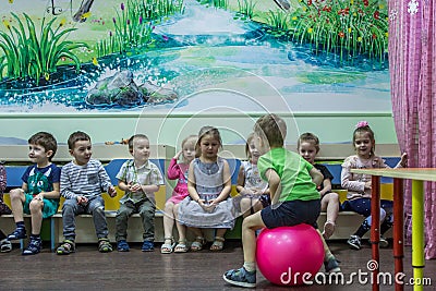 Children playing active games in the kindergarten. Editorial Stock Photo