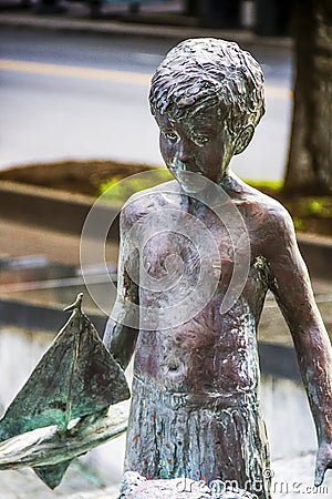 Children playing in fountains statues in Charlotte North Carolina Wells Fargo Plaza Editorial Stock Photo