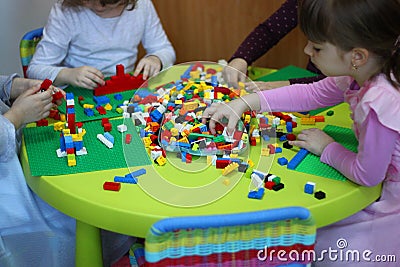 Children playing with lego Editorial Stock Photo