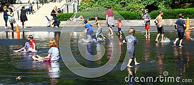 Children Playing in Millennium Park of Chicago Editorial Stock Photo