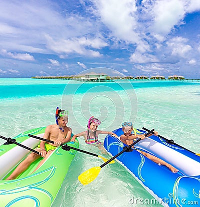 Children playing with rafts Stock Photo