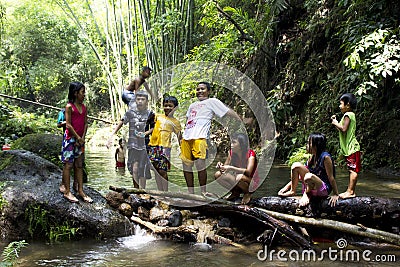 Children playing in a river Editorial Stock Photo