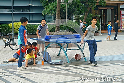 Shenzhen, China: Children Playing Table Tennis Fitness Editorial Stock Photo